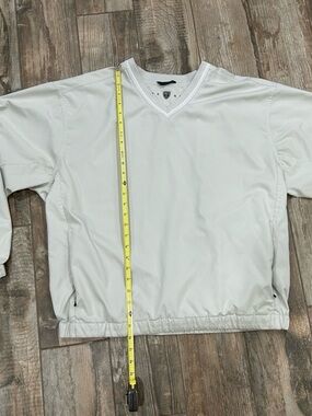 Nike Golf Beige size large v neck pullover with zip pockets